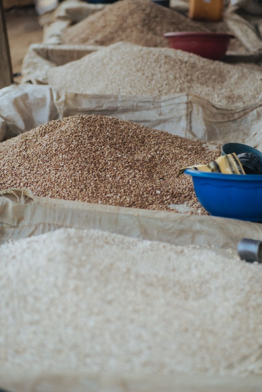 Sacks of grain stacked at a market